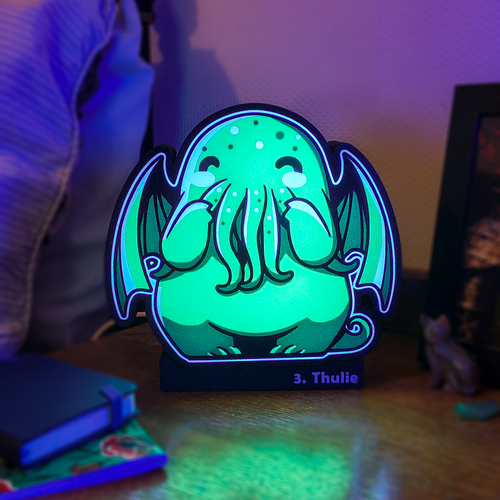 LunaKyn Thulie glowing creature night light on bedside desk